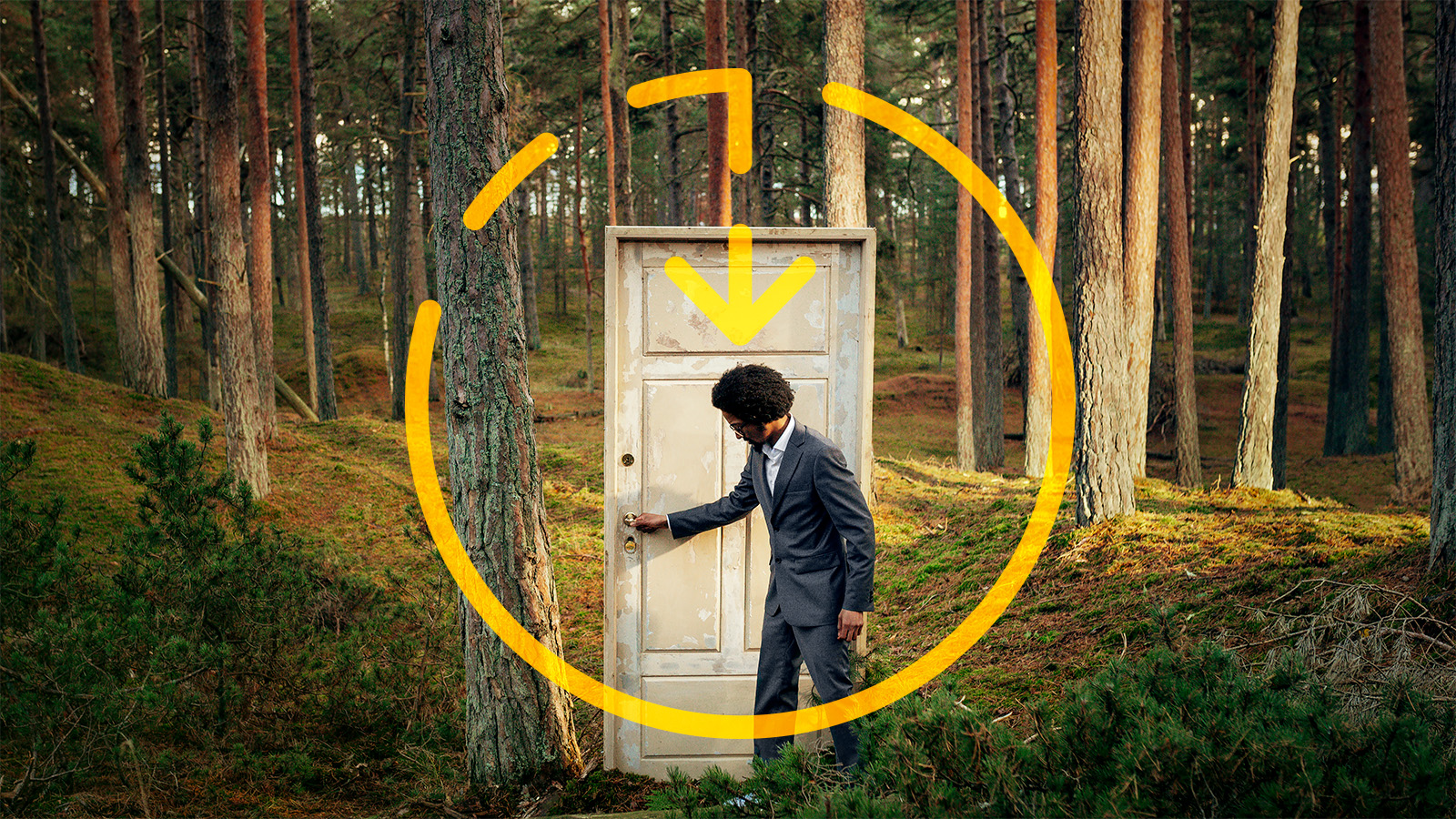 Man opening a door in the forest